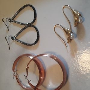 Three pair of earrings. Copper hoop, calla lily, teardrop dangle.